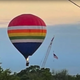 Footage of the hot air balloon as it flew in a residential area moments before crashing into a train.